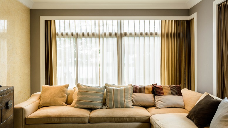 Sheer Curtains on windows in a living room